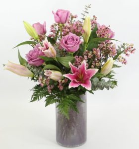 Pink lilies with lavender roses