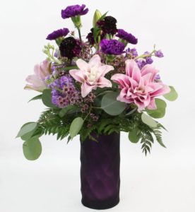 pink lilies and purple mums with greenery